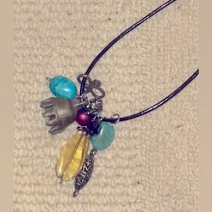 - New Bohemian artsy hippie long length leather charm necklace